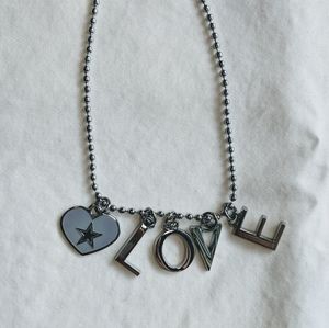 cowboys football team "love" necklace